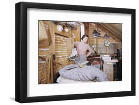 Woman Standing in an Attic-William P. Gottlieb-Framed Photographic Print