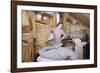 Woman Standing in an Attic-William P. Gottlieb-Framed Photographic Print