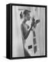 Woman Standing in Bathtub "Demonstrating" Various Gadgets for the Improvement of Bathing-Peter Stackpole-Framed Stretched Canvas