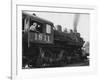 Woman Standing in Driver's Cabin in Locomotive-null-Framed Photo