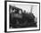 Woman Standing in Driver's Cabin in Locomotive-null-Framed Photo