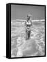 Woman Standing in Ocean Surf-Philip Gendreau-Framed Stretched Canvas