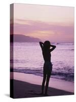 Woman Standing on Beach in Silhouette-Bill Romerhaus-Stretched Canvas