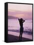 Woman Standing on Beach in Silhouette-Bill Romerhaus-Framed Stretched Canvas