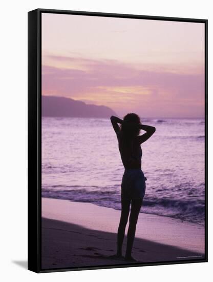 Woman Standing on Beach in Silhouette-Bill Romerhaus-Framed Stretched Canvas