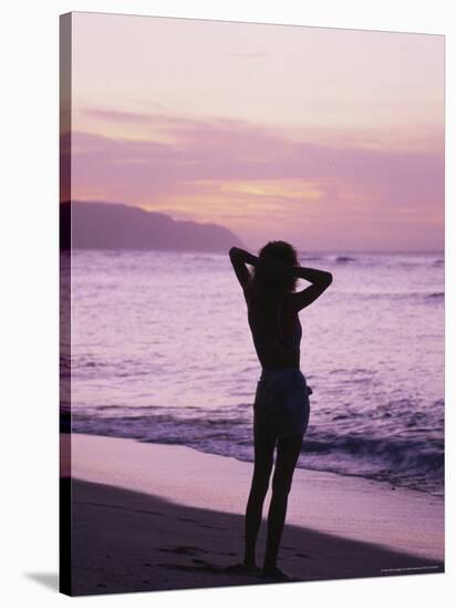 Woman Standing on Beach in Silhouette-Bill Romerhaus-Stretched Canvas