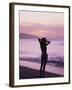 Woman Standing on Beach in Silhouette-Bill Romerhaus-Framed Photographic Print