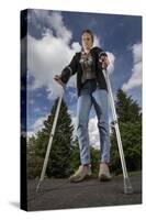 Woman Standing on Crutches-Anthony West-Stretched Canvas