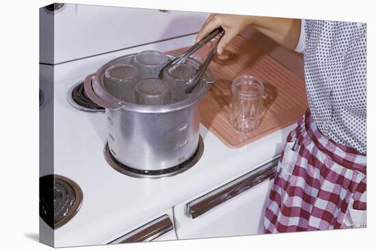 Woman Sterilizing Jars for Canning-William P. Gottlieb-Stretched Canvas