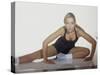 Woman Stretching Before Exercise-null-Stretched Canvas
