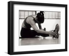 Woman Stretching During a Workout, New York, New York, USA-Paul Sutton-Framed Photographic Print