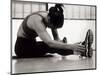 Woman Stretching During a Workout, New York, New York, USA-Paul Sutton-Mounted Photographic Print