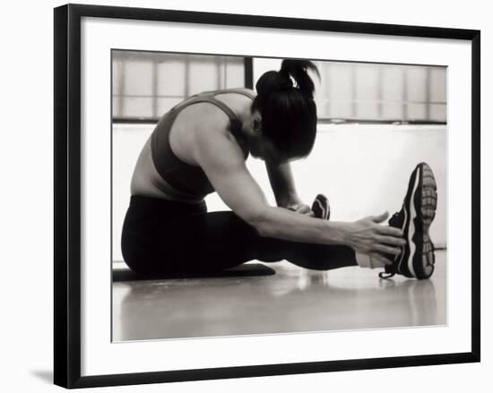 Woman Stretching During a Workout, New York, New York, USA-Paul Sutton-Framed Photographic Print