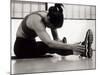 Woman Stretching During a Workout, New York, New York, USA-Paul Sutton-Mounted Photographic Print