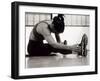 Woman Stretching During a Workout, New York, New York, USA-Paul Sutton-Framed Photographic Print