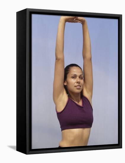 Woman Stretching Outdoors, New York, New York, USA-Chris Trotman-Framed Stretched Canvas