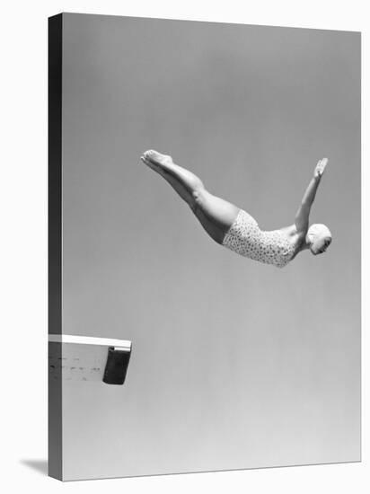 Woman Swan Dive Off Diving Board, 1950-null-Stretched Canvas