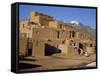 Woman Sweeping Up, in Front of the Adobe Buildings, Dating from 1450, Taos Pueblo, New Mexico, USA-Westwater Nedra-Framed Stretched Canvas