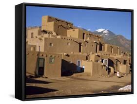 Woman Sweeping Up, in Front of the Adobe Buildings, Dating from 1450, Taos Pueblo, New Mexico, USA-Westwater Nedra-Framed Stretched Canvas