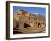 Woman Sweeping Up, in Front of the Adobe Buildings, Dating from 1450, Taos Pueblo, New Mexico, USA-Westwater Nedra-Framed Photographic Print