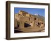 Woman Sweeping Up, in Front of the Adobe Buildings, Dating from 1450, Taos Pueblo, New Mexico, USA-Westwater Nedra-Framed Photographic Print