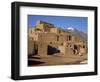 Woman Sweeping Up, in Front of the Adobe Buildings, Dating from 1450, Taos Pueblo, New Mexico, USA-Westwater Nedra-Framed Photographic Print