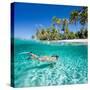Woman Swimming in a Clear Tropical Waters in Front of Exotic Island-BlueOrange Studio-Stretched Canvas
