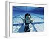 Woman Swimming Underwater in a Swimming Pool-null-Framed Photographic Print