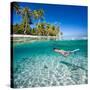 Woman Swimming Underwater in Clear Tropical Waters in Front of Exotic Island-BlueOrange Studio-Stretched Canvas