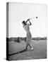 Woman Swinging Golf Club-Philip Gendreau-Stretched Canvas