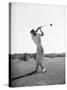 Woman Swinging Golf Club-Philip Gendreau-Stretched Canvas