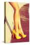 Woman Tan Legs In High Heel Yellow Shoes Outdoor Shot Summer Day-coka-Stretched Canvas