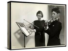 Woman Teaching a Blind Young Man to Play the Violin at the New York Associa-Byron Company-Stretched Canvas