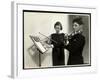 Woman Teaching a Blind Young Man to Play the Violin at the New York Associa-Byron Company-Framed Giclee Print