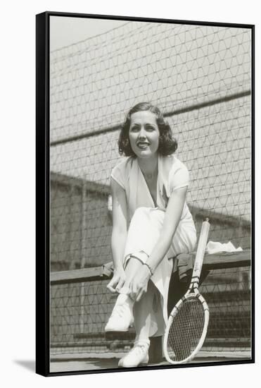 Woman Tennis Player Adjusting Stocking-null-Framed Stretched Canvas