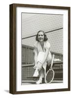 Woman Tennis Player Adjusting Stocking-null-Framed Art Print