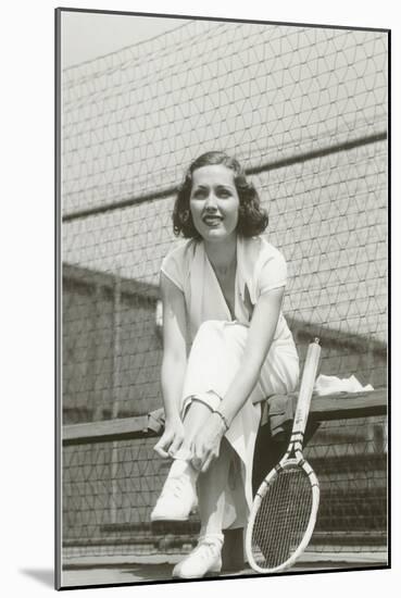 Woman Tennis Player Adjusting Stocking-null-Mounted Art Print