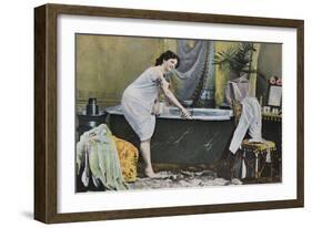 Woman Testing Water Temperature in Bathtub-null-Framed Giclee Print