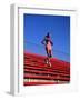 Woman Training on Stadium Stairs-null-Framed Photographic Print