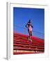 Woman Training on Stadium Stairs-null-Framed Photographic Print