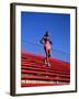 Woman Training on Stadium Stairs-null-Framed Photographic Print