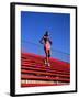 Woman Training on Stadium Stairs-null-Framed Photographic Print