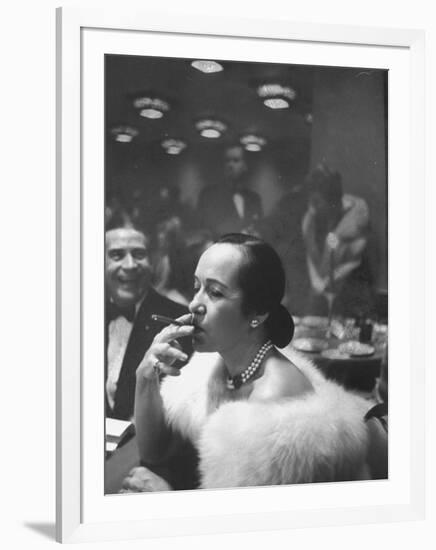 Woman Tries Lady's Cigar in Club After Release of Surgeon General's Report on Smoking Hazards-Ralph Morse-Framed Photographic Print