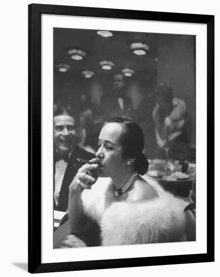 Woman Tries Lady's Cigar in Club After Release of Surgeon General's Report on Smoking Hazards-Ralph Morse-Framed Photographic Print