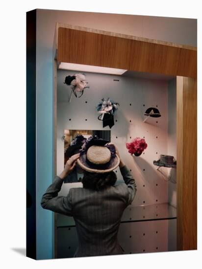 Woman Trying on Hats-Alfred Eisenstaedt-Stretched Canvas