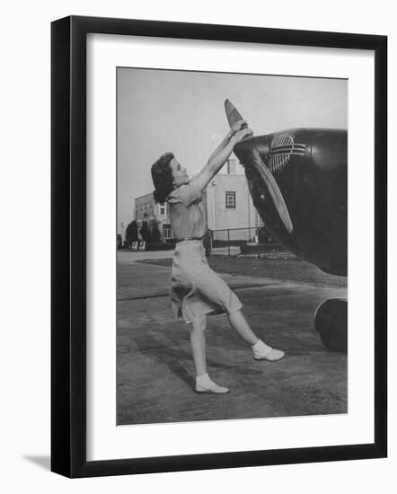Woman Turning Propeller to Start Plane-David Scherman-Framed Photographic Print