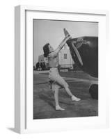 Woman Turning Propeller to Start Plane-David Scherman-Framed Photographic Print