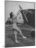 Woman Turning Propeller to Start Plane-David Scherman-Mounted Photographic Print