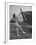 Woman Turning Propeller to Start Plane-David Scherman-Framed Photographic Print