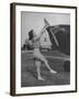 Woman Turning Propeller to Start Plane-David Scherman-Framed Photographic Print